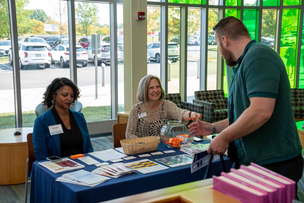 Guests learn about Library programs and the CCPL Foundation at stations in the Parma-Snow Branch.