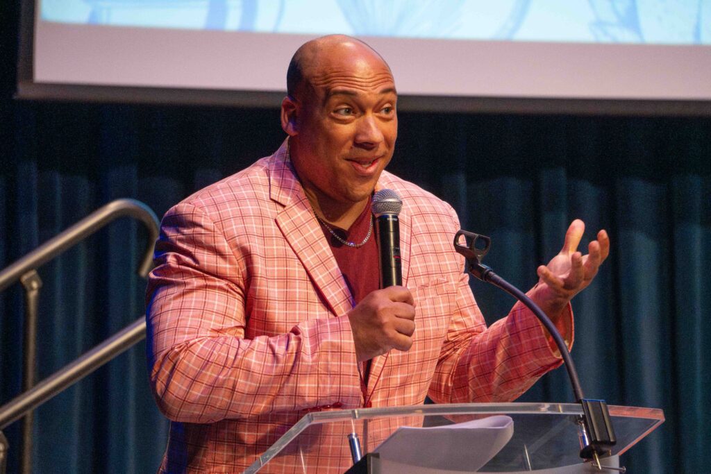 CCPL CEO Jamar Rahming greets the crowd at Books and Bites 2025.