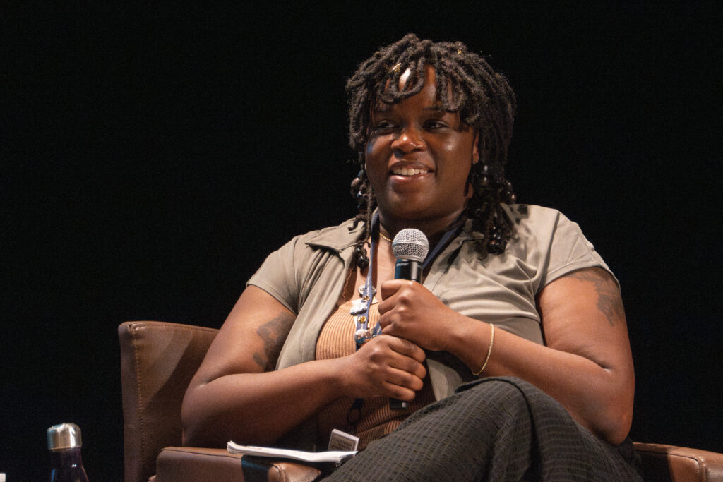 Angel Doughty speaks to an audience.