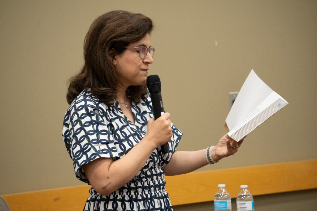 Author Marjan Kamali reads to the audience from her book, The Lion Women of Tehran.