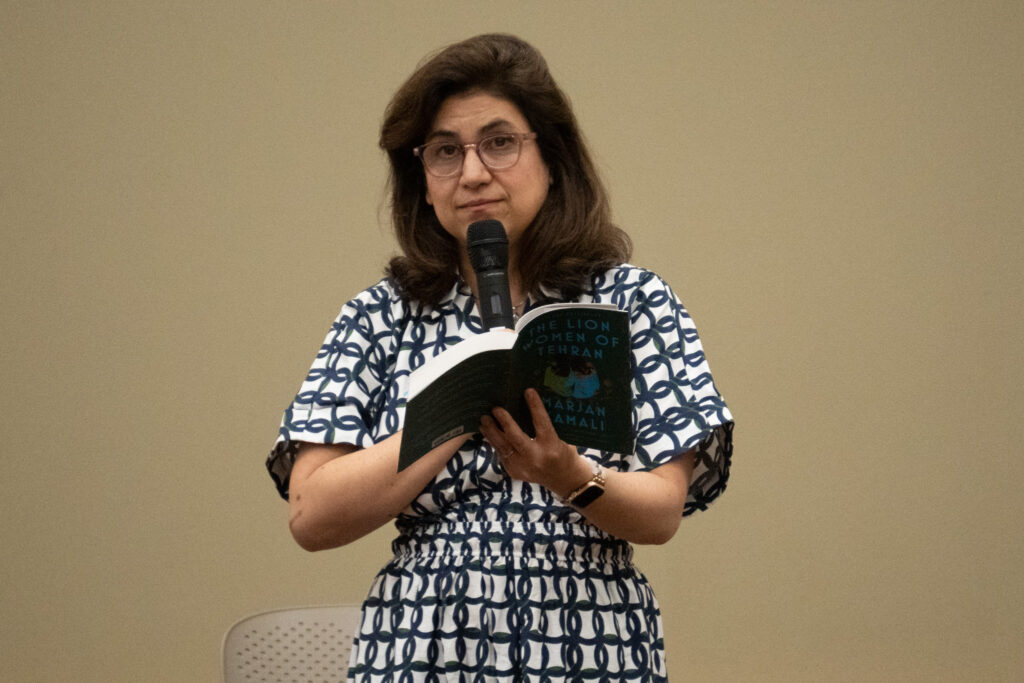 Author Marjan Kamali reads to the audience from her book, The Lion Women of Tehran.